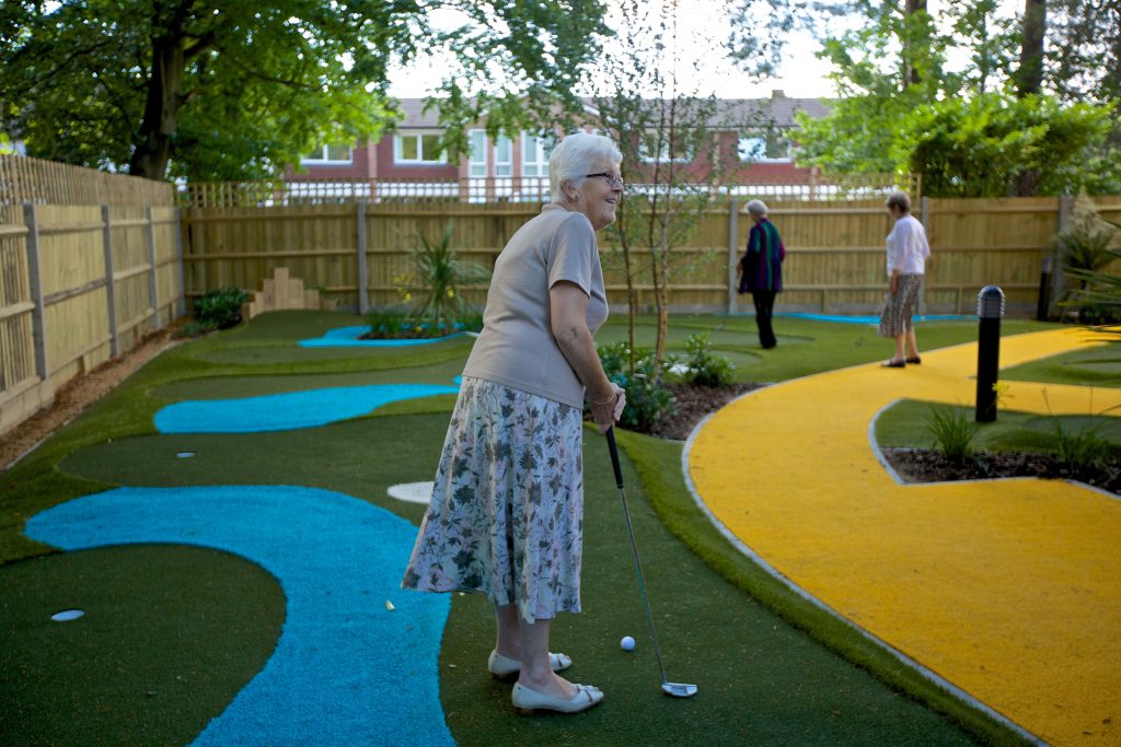 Camberley manor care home in Surrey Golf course activity by TLC Care-min